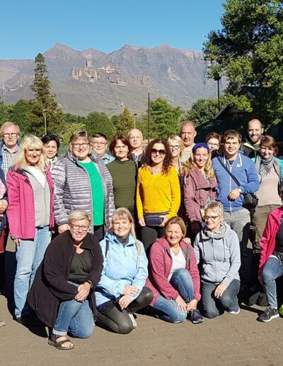 large tour group posing for camera
